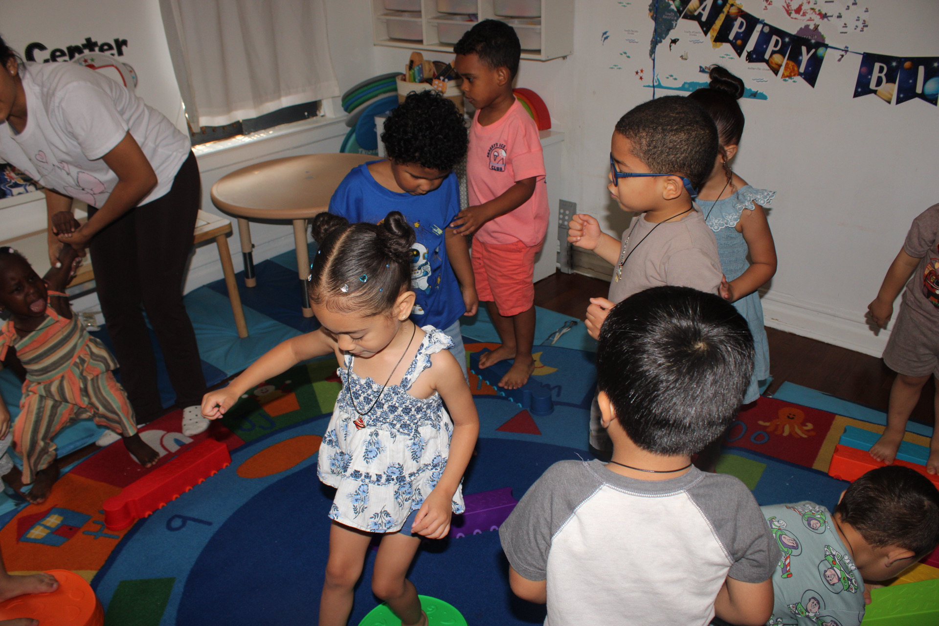 Children learning and playing together in the classroom